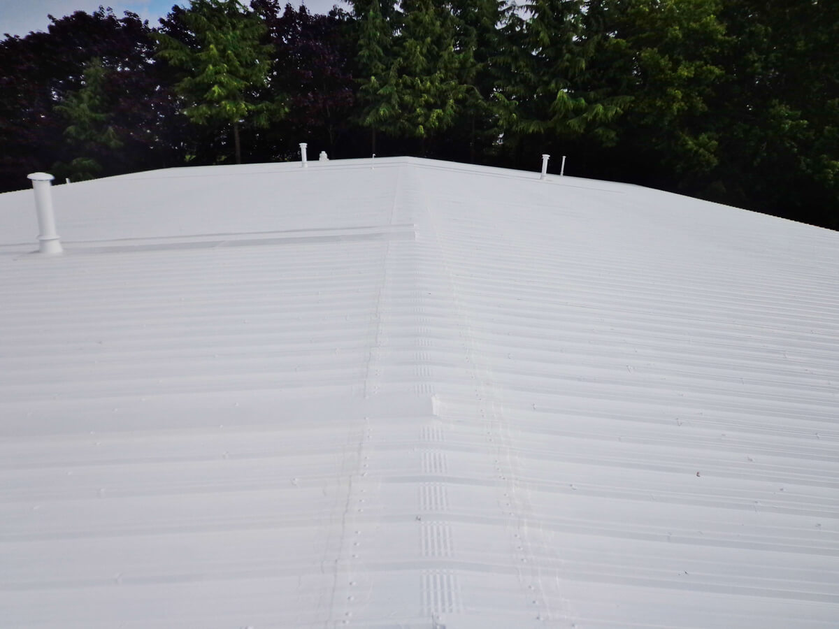 A finished roof coated with Inland's SEBS coatings.