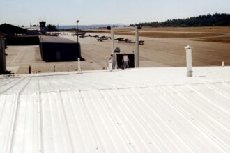 worker working on roof