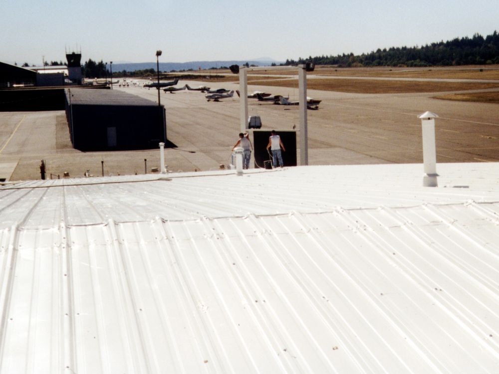 worker walking on roof