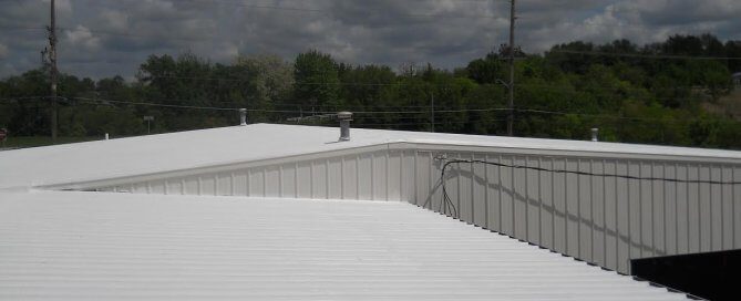 A picture of two warehouses coated with Inland Coatings.