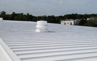 Commercial roof with a white roof coating