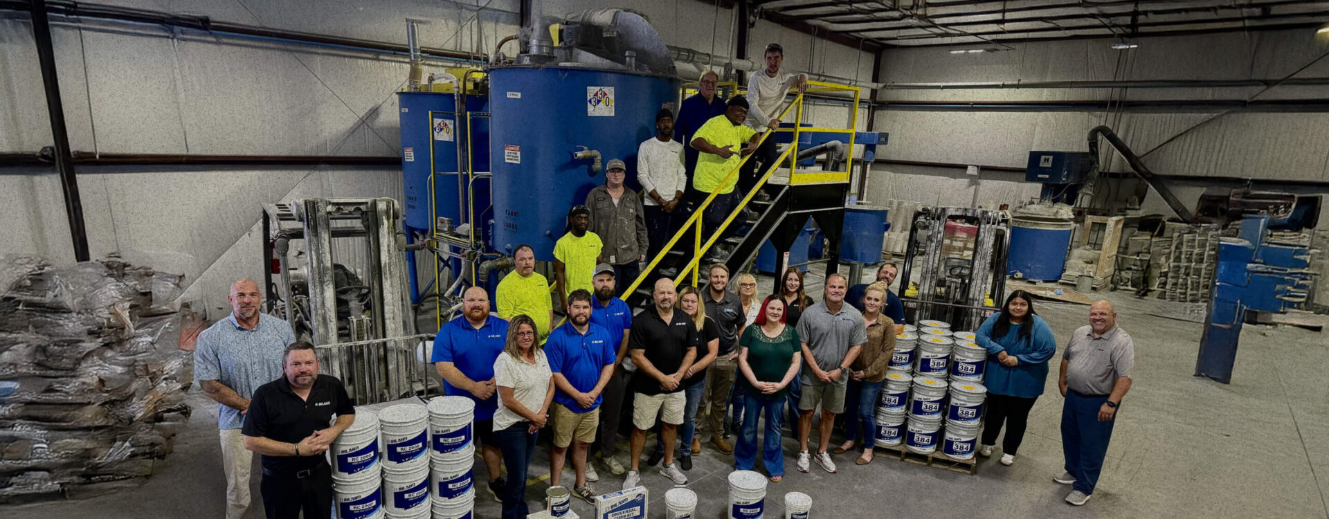 inland team smiling for group portrait