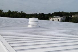 Commercial roof with a white roof coating