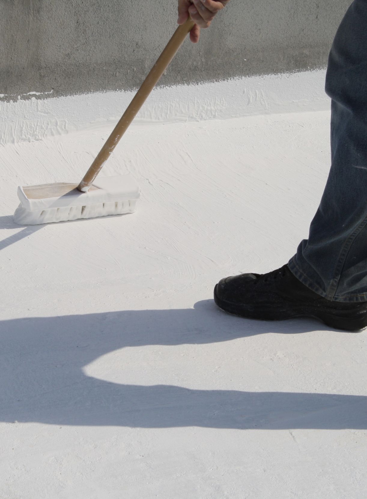 applying roof coating